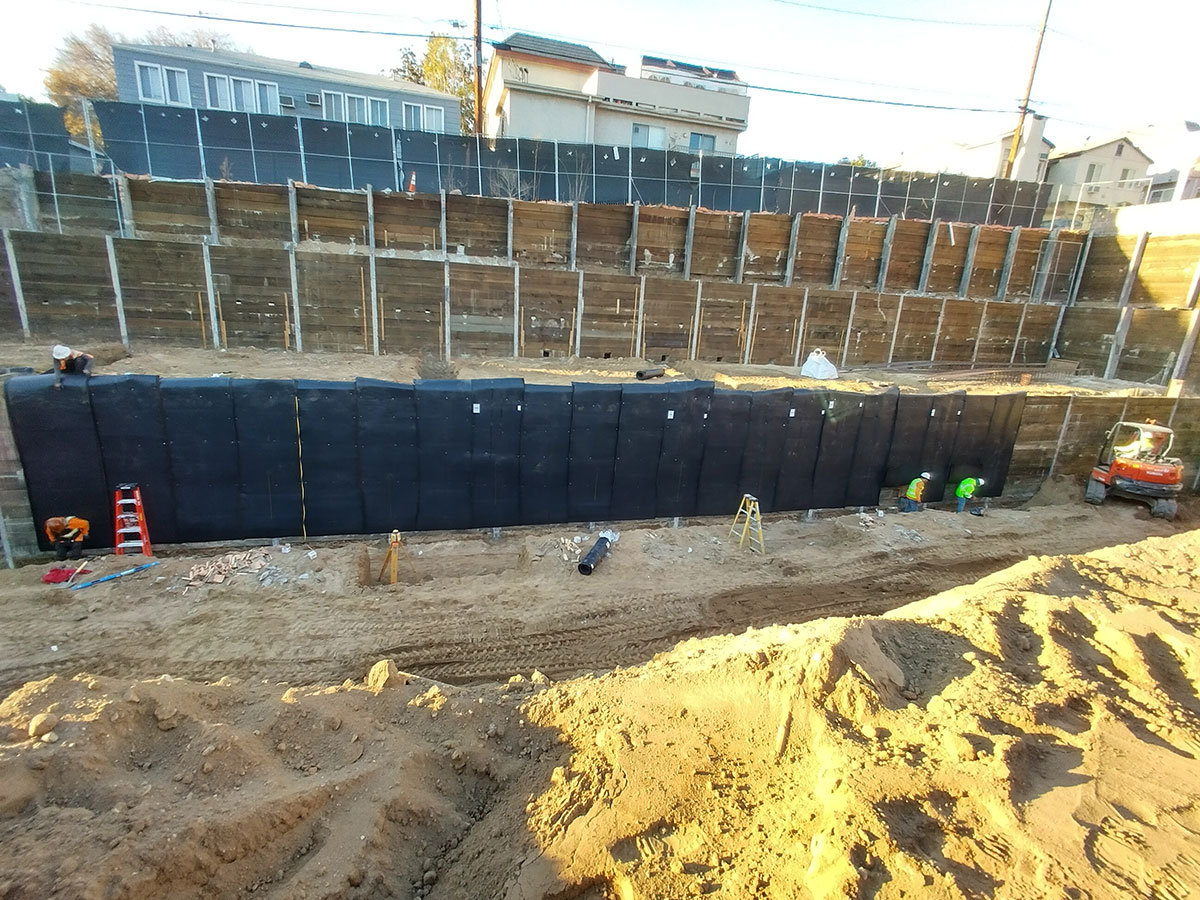ESC team pouring concrete for a new foundation.