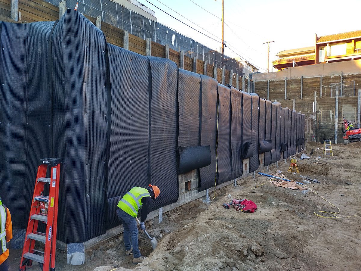 ESC team using reinforced steel to retrofit a building.