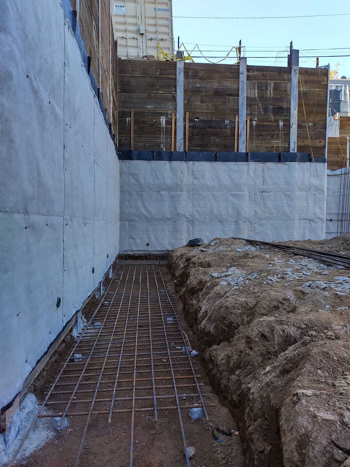 ESC team member inspecting a structural beam.